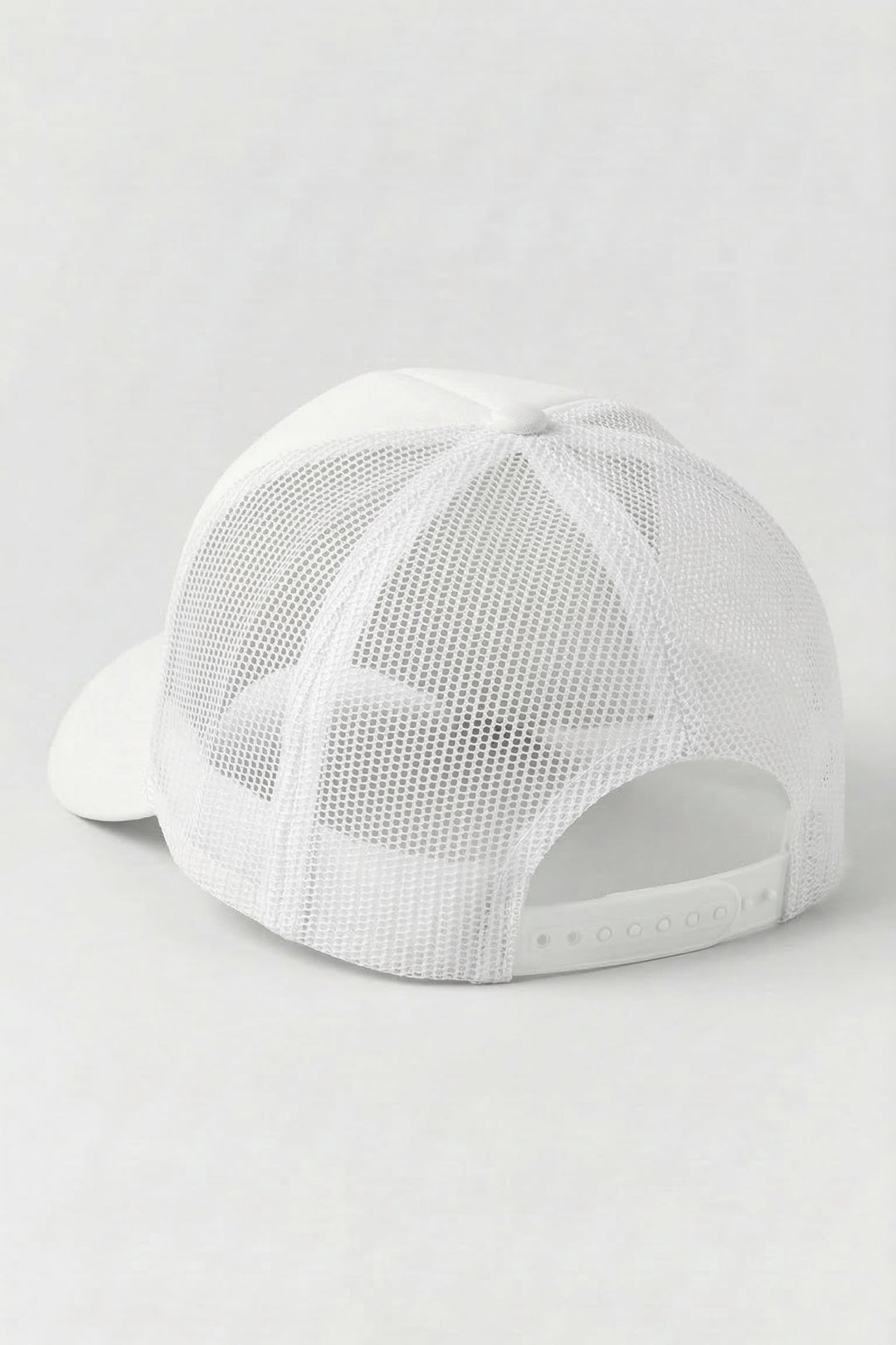 White mesh cap on a light gray background