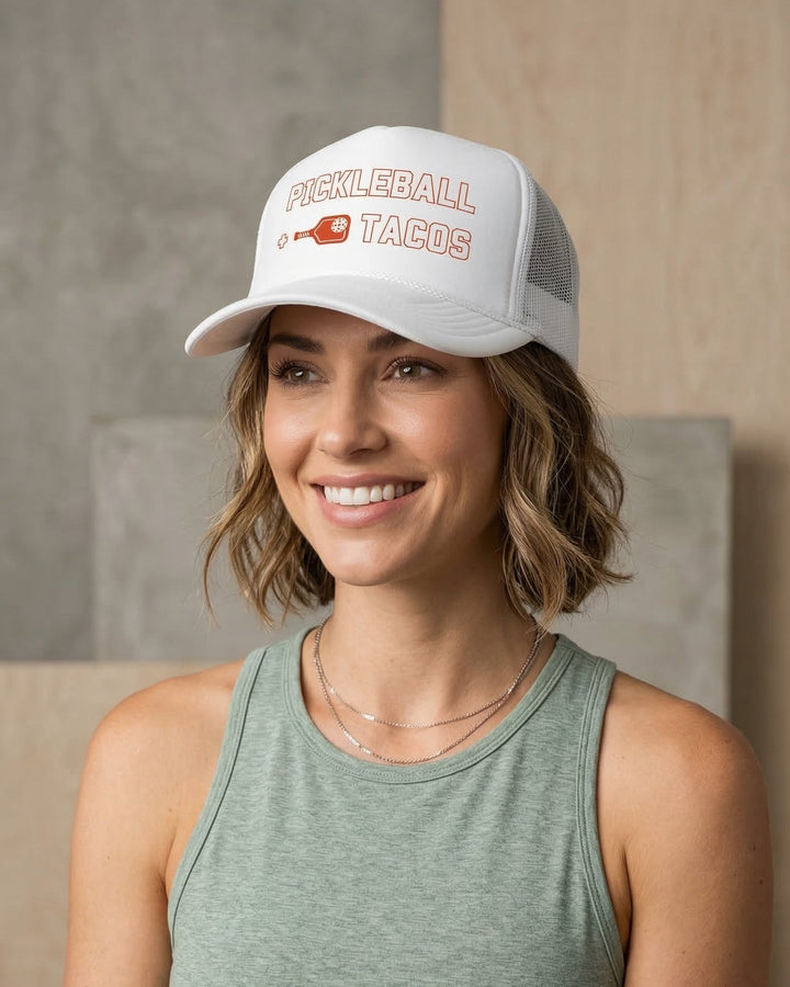 Woman wearing a cap with &