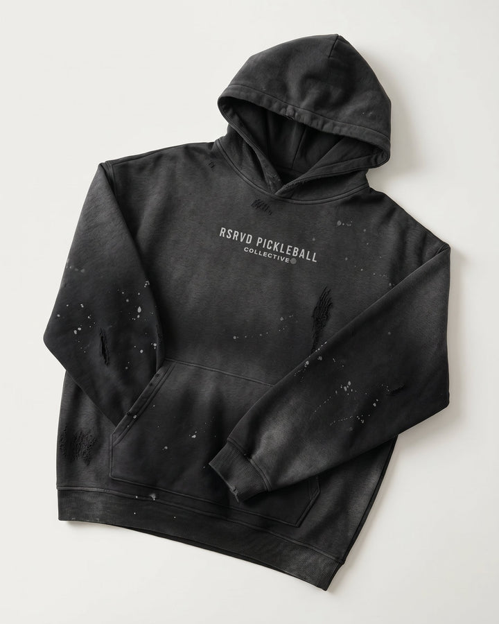Black hoodie with speckled design and &